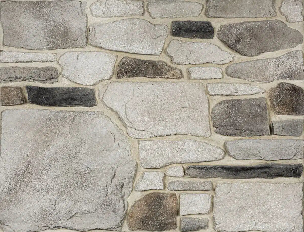 Casa Di Sassi Osso Country Rubble veneer featuring warm bone-toned stone colors, irregular rubble stone shapes, and authentic European masonry character.