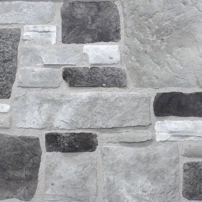 Casa Di Sassi Polare Blend veneer featuring cool light neutral stone tones, subtle textured surfaces, and refined modern masonry character