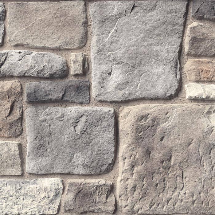 Casa Di Sassi Turin Old World veneer featuring irregular aged stone shapes, soft gray tones, and classic European natural stone texture.