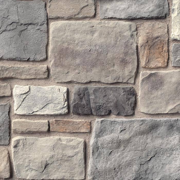 Casa Di Sassi Turin Volterra veneer featuring cool gray limestone tones, refined textured stone surfaces, and classic European masonry character
