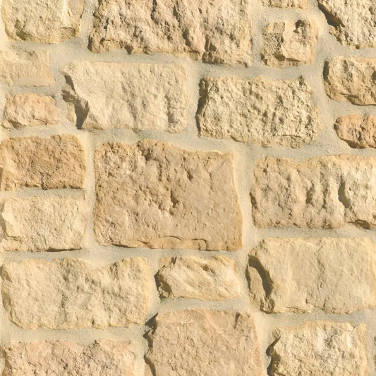 Handcrafted limestone stone veneer with warm butternut tones and natural texture inspired by orchard landscapes, part of the Creative Mines® collection.