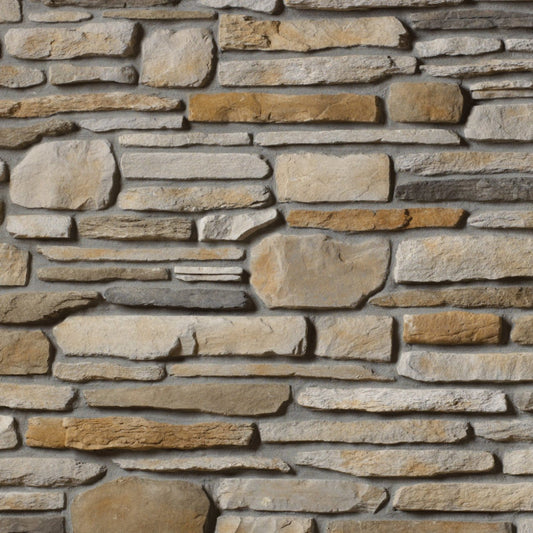 Cultured Stone Aspen Southern Ledgestone veneer featuring soft cream and light gray tones, layered stacked stone texture, and natural stone depth