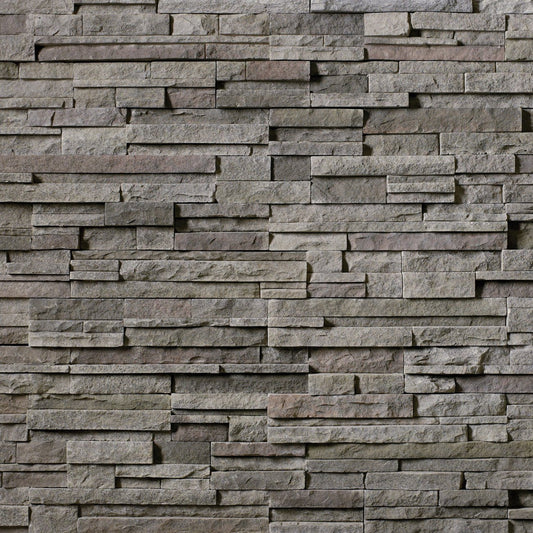 Cultured Stone Black Mountain Pro-Fit Alpine Ledgestone veneer featuring deep charcoal-black tones, rugged stacked texture, and natural stone character in panel form