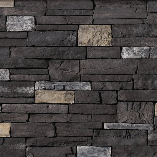 Cultured Stone Black Rundle Country Ledgestone veneer featuring deep charcoal and black tones, layered stacked texture, and bold rugged stone character