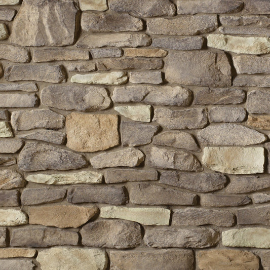 Cultured Stone Burnt Ochre Del Mare Ledgestone veneer featuring warm ochre tones, layered stacked texture, and rugged natural stone character.