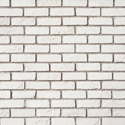 Cultured Stone Canvas unpainted handmade brick veneer with artisan texture, irregular edges, and a clean neutral base for customizable finishes.