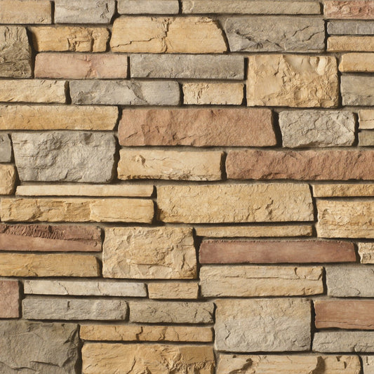 Cultured Stone Caramel Country Ledgestone veneer featuring warm caramel and tan tones, layered stacked texture, and natural rustic stone character.