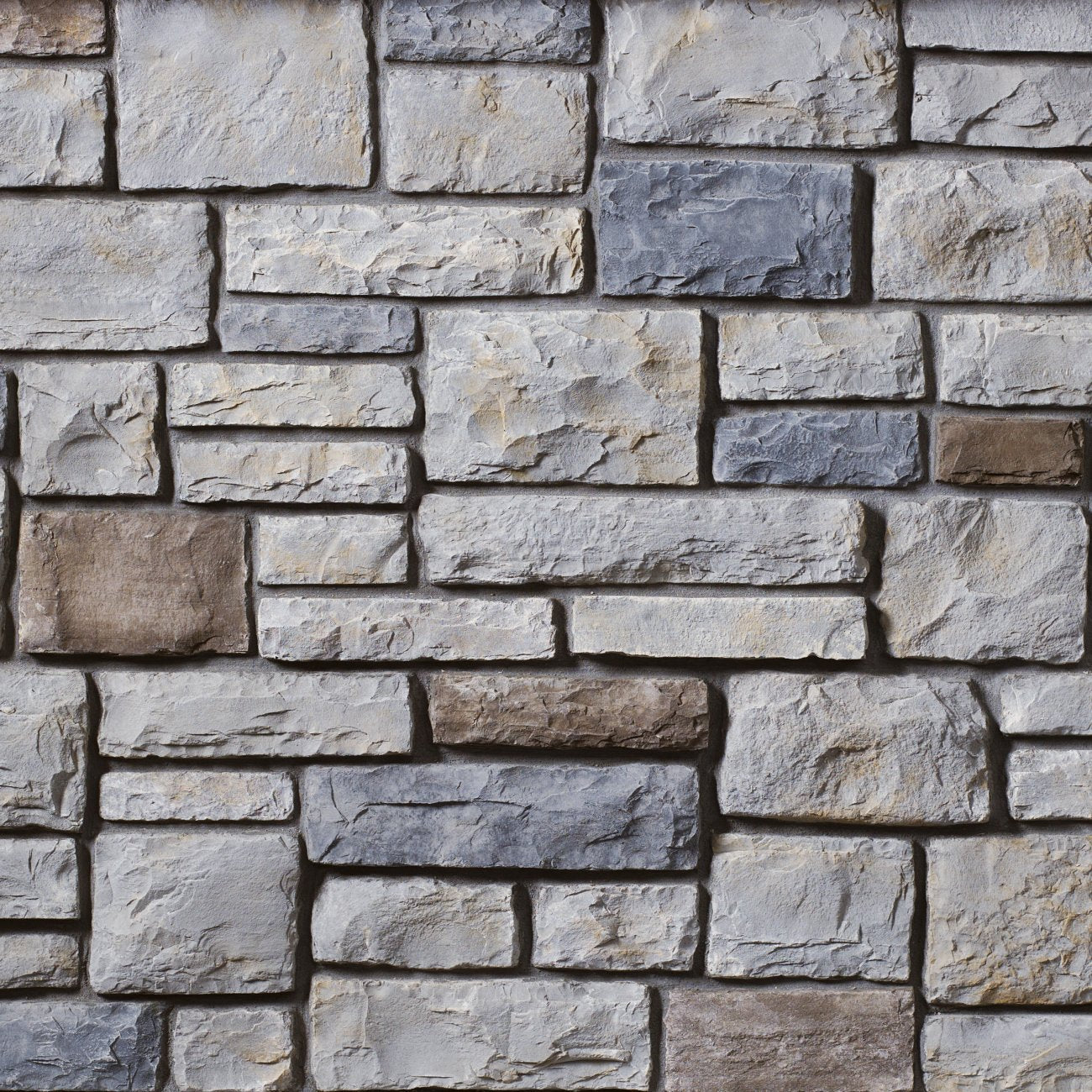 Cultured Stone Echo Ridge Cobblefield stone veneer featuring cool gray tones, classic cobblestone texture, and weathered Old World masonry character.