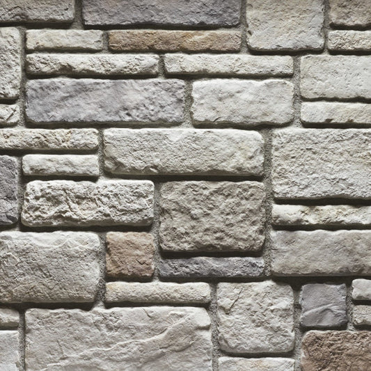 Cultured Stone Echo Ridge Sculpted Ashlar veneer featuring soft gray and taupe tones, refined ashlar stone shapes, and classic masonry texture