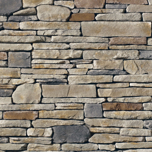 Cultured Stone Echo Ridge Southern Ledgestone veneer featuring soft gray and taupe tones, layered stacked stone texture, and natural stone depth