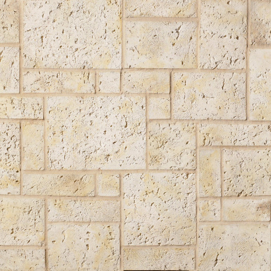 Cultured Stone Fossil Reef Coral Stone veneer featuring warm coastal tones, porous coral texture, and weathered island-inspired stone character