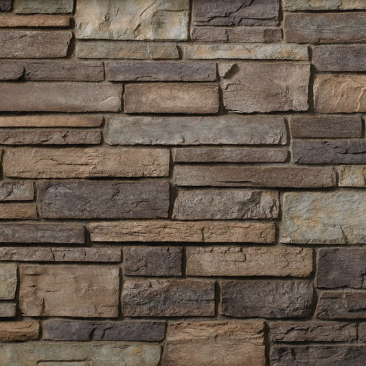 Cultured Stone Grand Mesa Country Ledgestone veneer featuring warm earth-tone color variation, layered stacked texture, and rugged natural stone character.