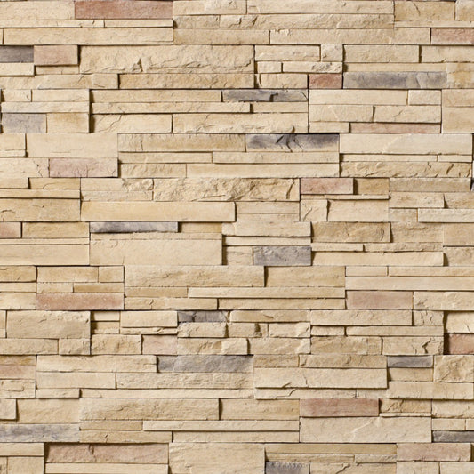 Cultured Stone Mojave Pro-Fit Ledgestone veneer featuring warm desert tones, stacked layered texture, and rugged natural stone character in panel form
