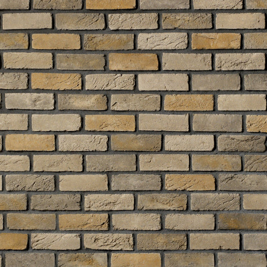 Cultured Stone Moroccan Sand handmade brick veneer featuring warm sandy tones, artisan texture, irregular edges, and timeless brick character.