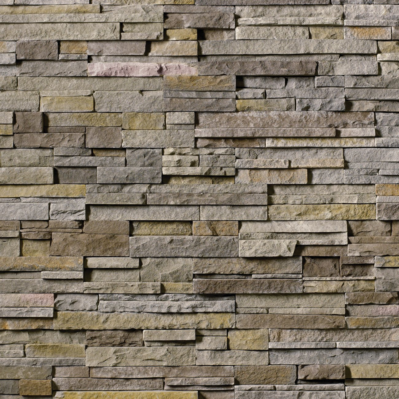 Cultured Stone Pheasant Pro-Fit Alpine Ledgestone veneer featuring warm brown and tan tones, layered alpine texture, and natural stone depth