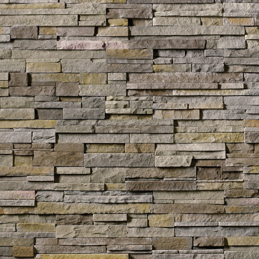 Cultured Stone Pheasant Pro-Fit Alpine Ledgestone veneer featuring warm brown and tan tones, layered alpine texture, and natural stone depth