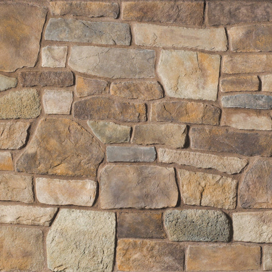Cultured Stone Sevilla Ancient Villa Ledgestone veneer featuring warm sun-kissed tones, layered stacked texture, and Old World Mediterranean stone character.