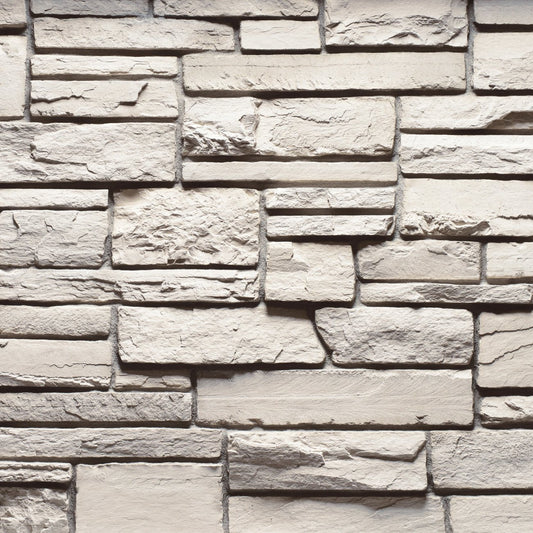 Cultured Stone Wheaton Country Ledgestone veneer featuring warm earthy tones, layered stacked texture, and rugged natural stone character.