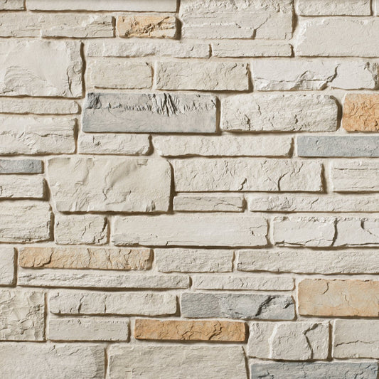 Cultured Stone White Oak Country Ledgestone veneer featuring soft neutral tones, layered stacked texture, and rugged natural stone character.