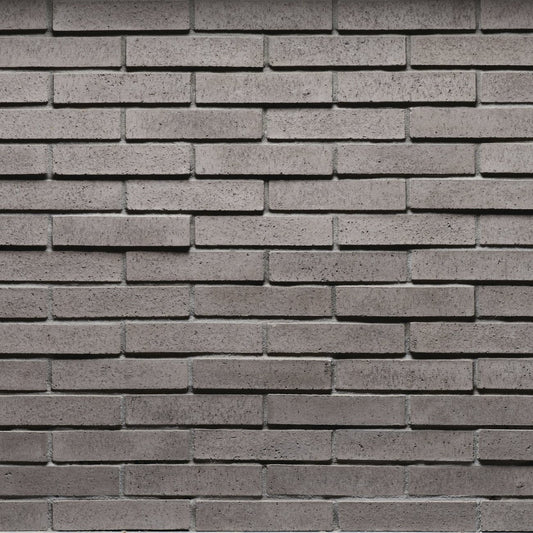 Cultured Stone Wildon Tenley Brick veneer featuring warm white and soft gray tones, slim linear brick profile, and refined masonry texture