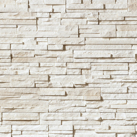 Cultured Stone Winterhaven Pro-Fit Alpine Ledgestone veneer featuring cool white and light gray tones, layered alpine texture, and natural stone depth.