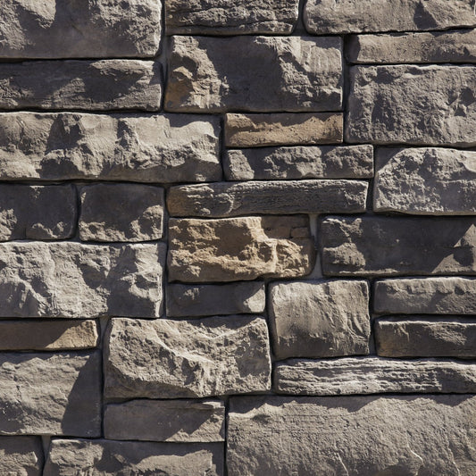 Dutch Quality Ashen Weather Ledge veneer featuring cool gray tones, weathered layered texture, and rugged dimensional ledgestone character.