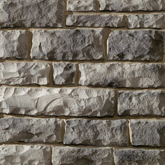 Dutch Quality Charcoal Limestone veneer featuring deep charcoal tones, chiseled limestone texture, and modern rectangular stone profiles