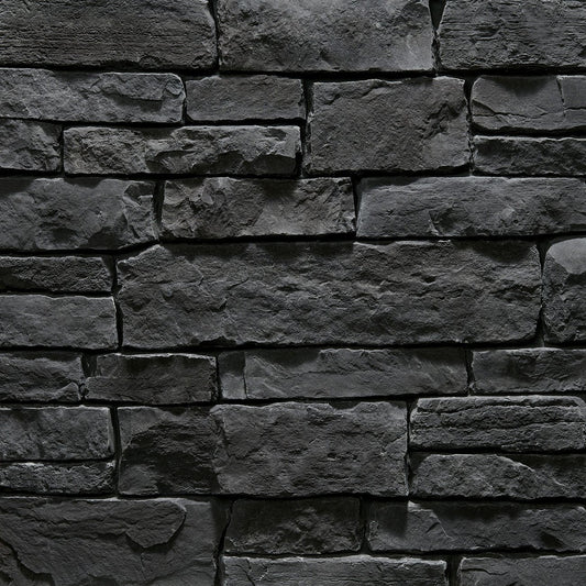 Dutch Quality Coal Crest Weather Ledge veneer featuring deep charcoal tones, weathered layered texture, and rugged dimensional ledgestone character.