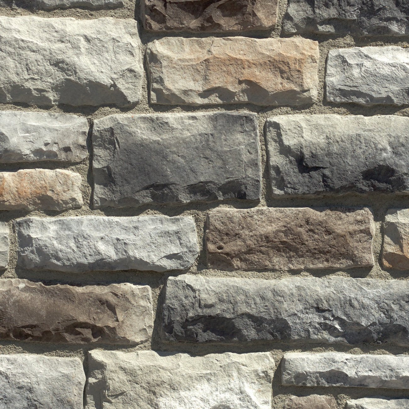 Dutch Quality Elkwood Limestone veneer featuring warm brown and taupe tones, chiseled limestone texture, and classic rectangular stone profiles