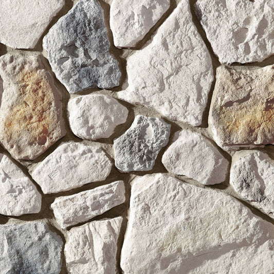 Dutch Quality Kentucky Fieldstone stone veneer featuring irregular shapes, warm earth tones, and rugged natural texture
