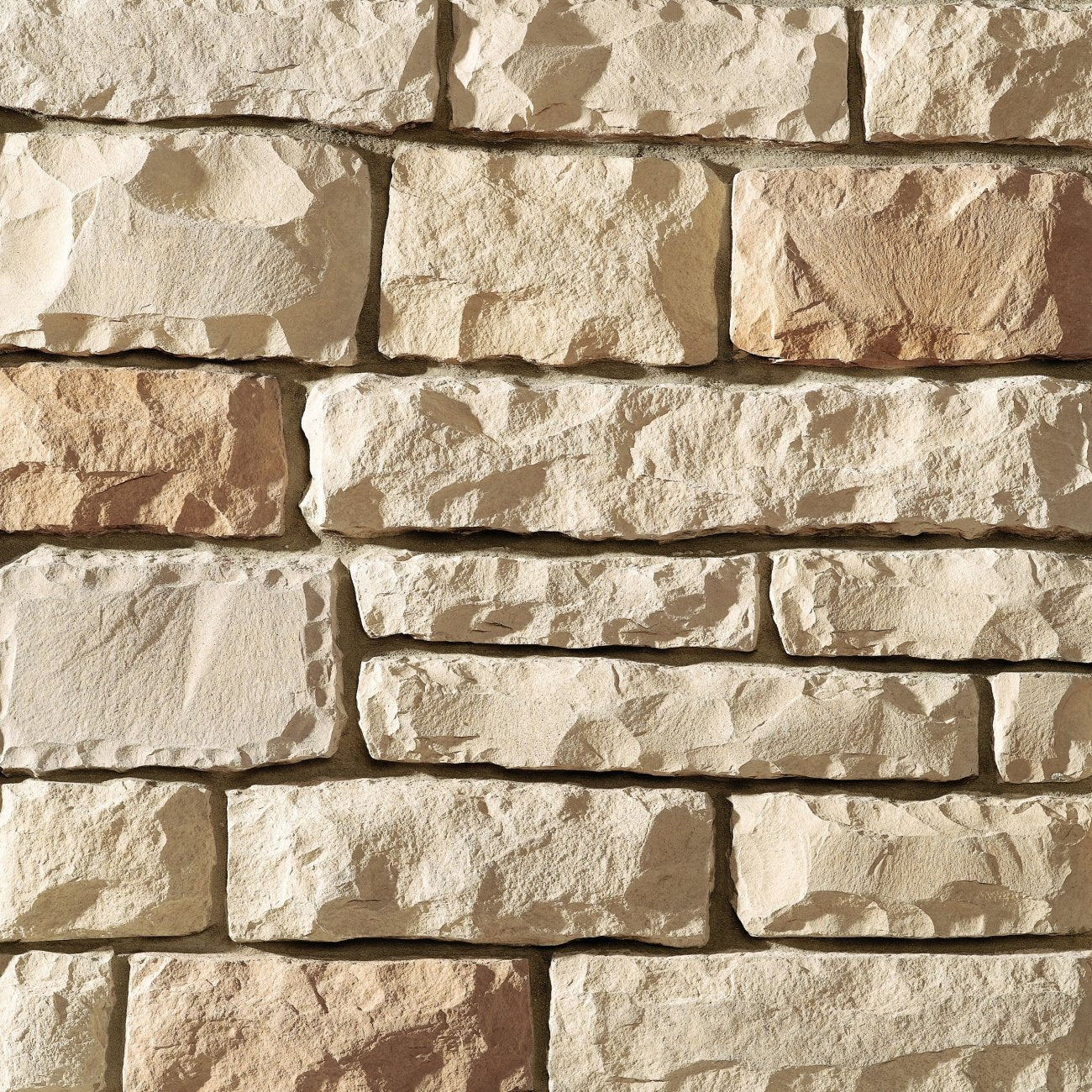 Dutch Quality Ohio Tan Limestone veneer featuring soft tan tones, chiseled limestone texture, and classic rectangular stone profiles