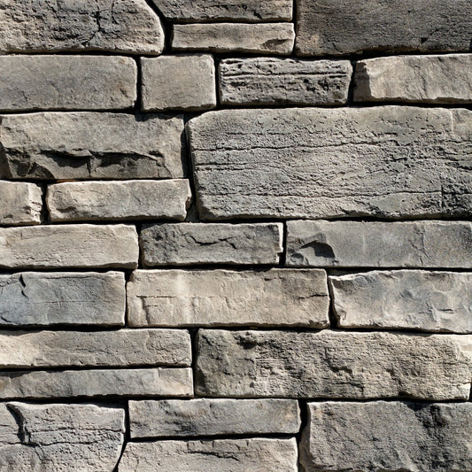 Dutch Quality Quail Grey Weather Ledge veneer featuring soft gray tones, weathered layered texture, and rugged dimensional ledgestone character