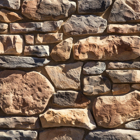 Dutch Quality Sienna Tuscan Ridge veneer featuring warm sienna and brown tones, rugged layered texture, and Old World Tuscan stone character