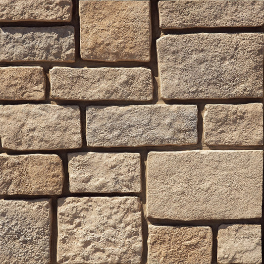 Dutch Quality Trailhead Rough Ashlar veneer featuring warm earth tones, rugged split-face texture, and classic ashlar stone pattern
