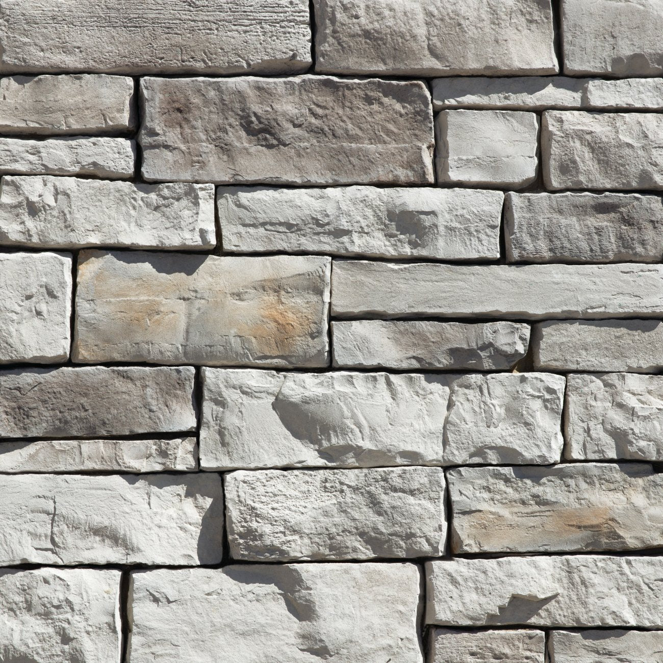 Dutch Quality Winter Point Weather Ledge veneer featuring cool gray and taupe tones, weathered layered texture, and rugged dimensional ledgestone character