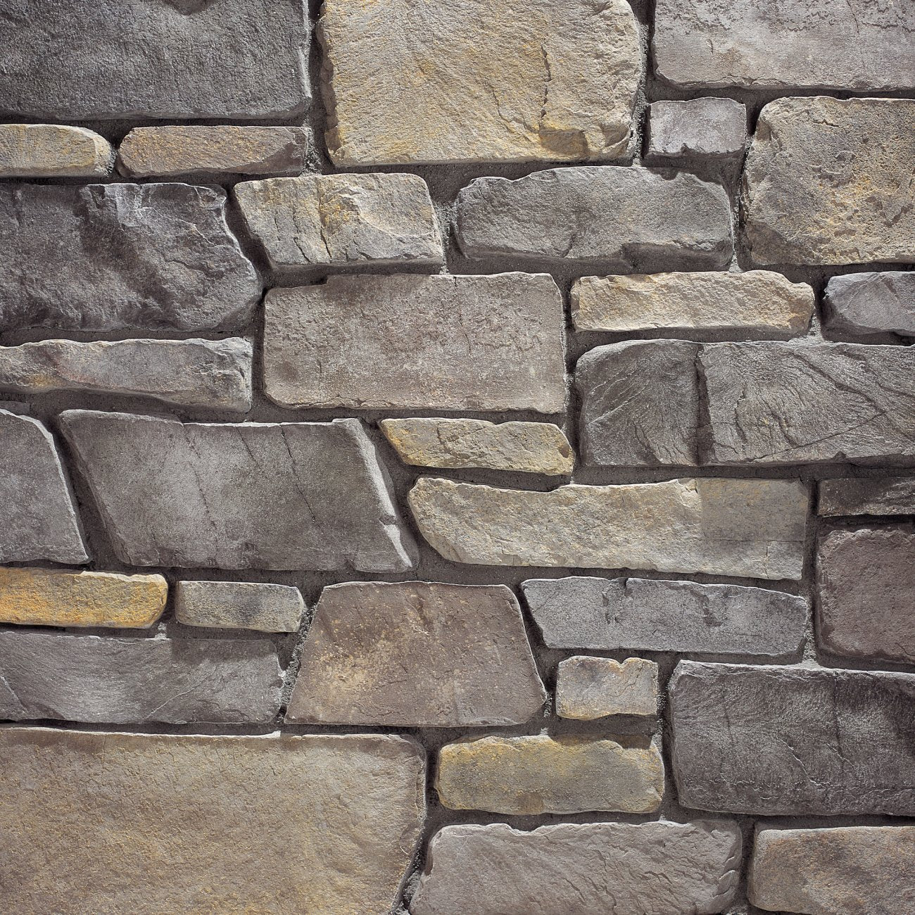 Eldorado Andante Fieldledge stone veneer with rugged fieldstone shapes in warm earth tones and weathered texture