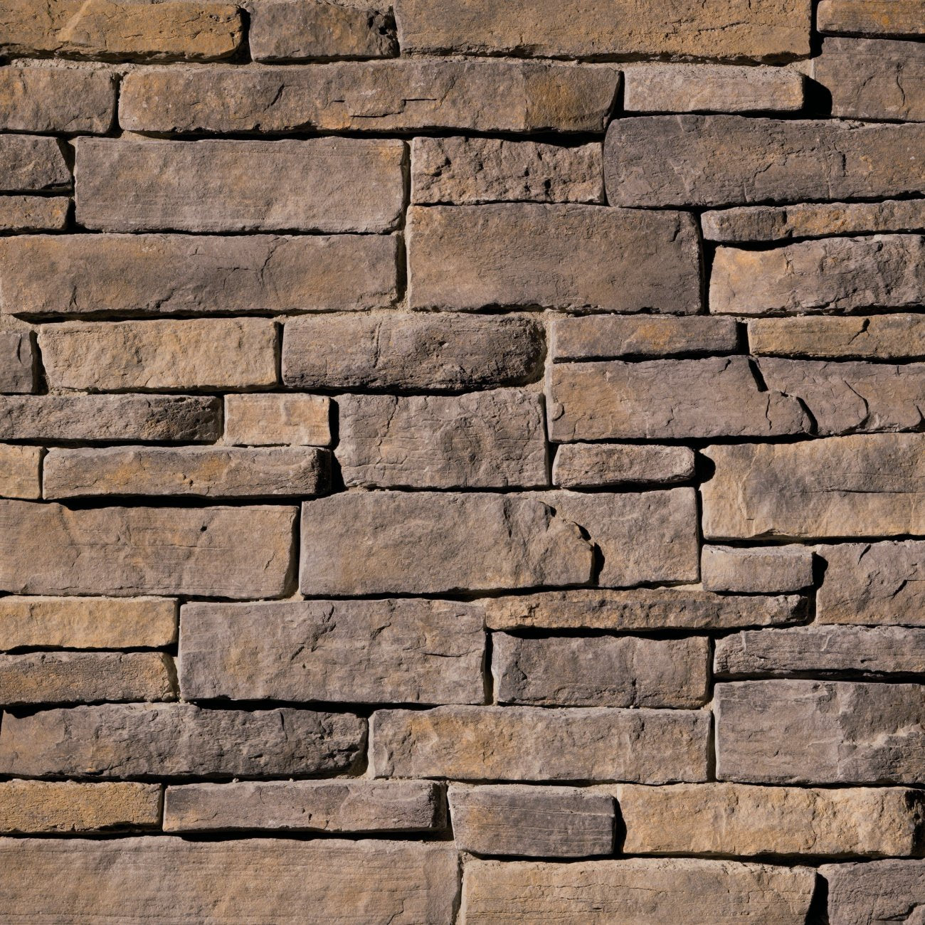 Eldorado Asheville Mountain Ledge rugged gray and charcoal hand-split ledgestone with deep texture and varied stone profiles