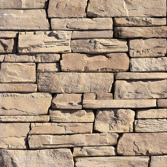 Eldorado Barley Cliffstone stone veneer in warm tan and golden tones with natural ledgestone texture