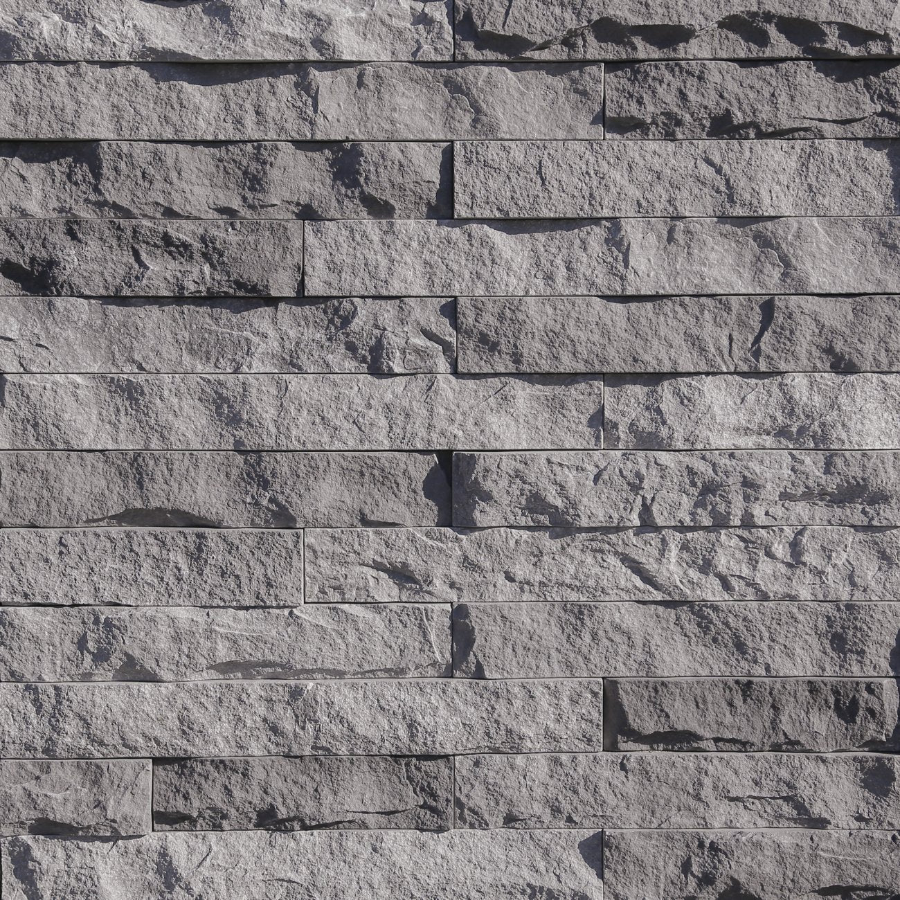 Eldorado Beach Pebble LedgeCut33 stone veneer with cool gray and neutral tones in a clean, modern stacked-stone profile