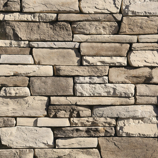 Eldorado Boardwalk Cliffstone stone veneer in soft gray and taupe tones with natural ledgestone texture