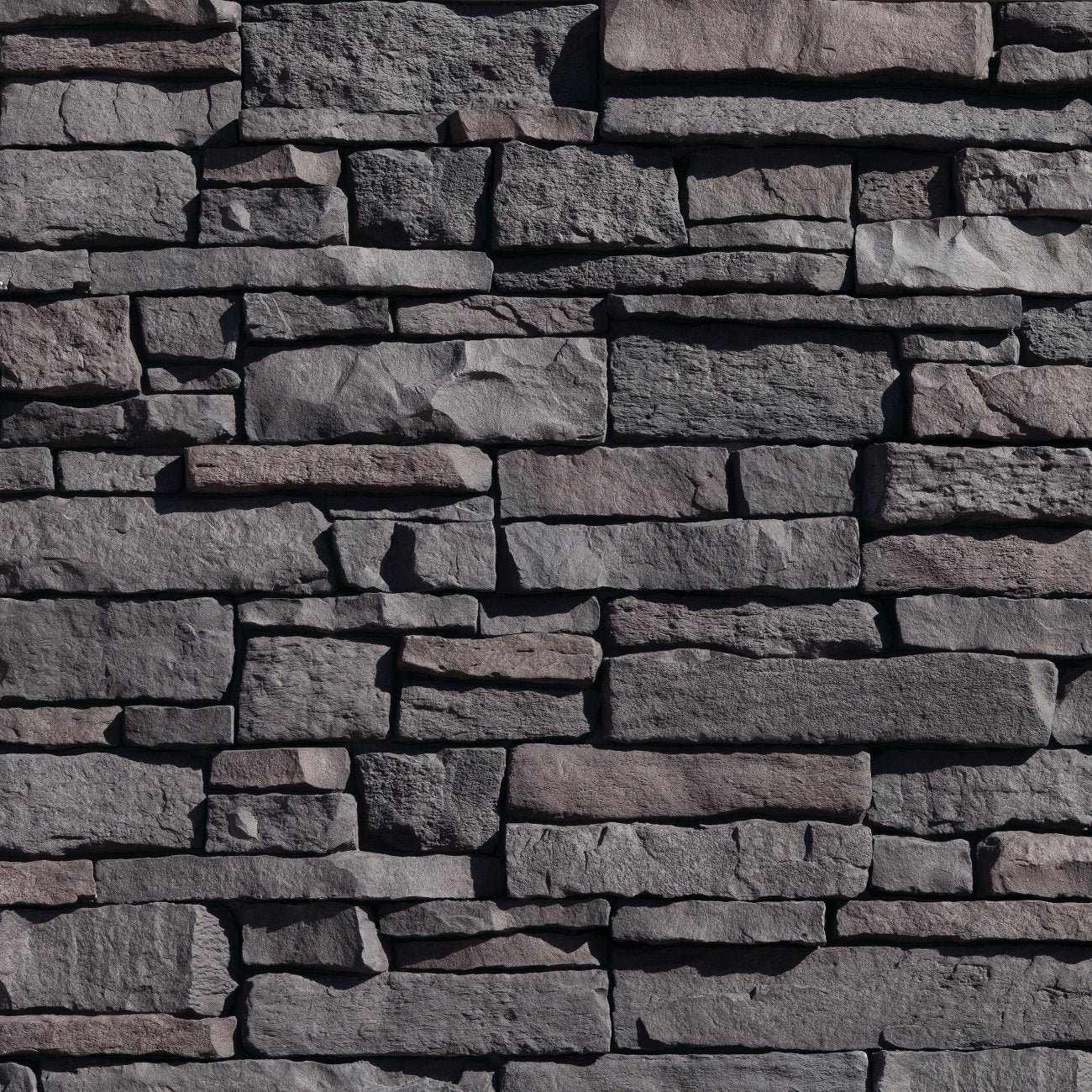 Eldorado Bow Valley Mountain Ledge Panels in cool gray and weathered neutral tones with rugged hand-split ledgestone texture