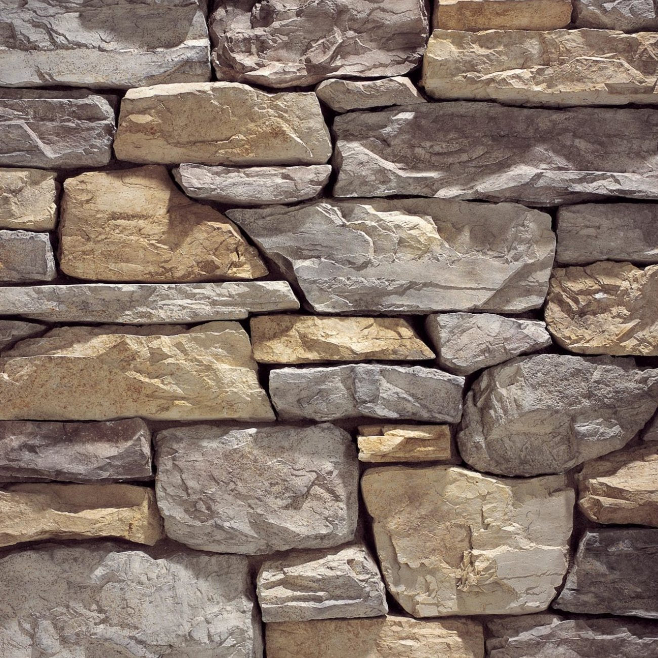 Eldorado Chesapeake Shadow Rock with rugged, irregular stone faces in cool gray, taupe, and charcoal tones