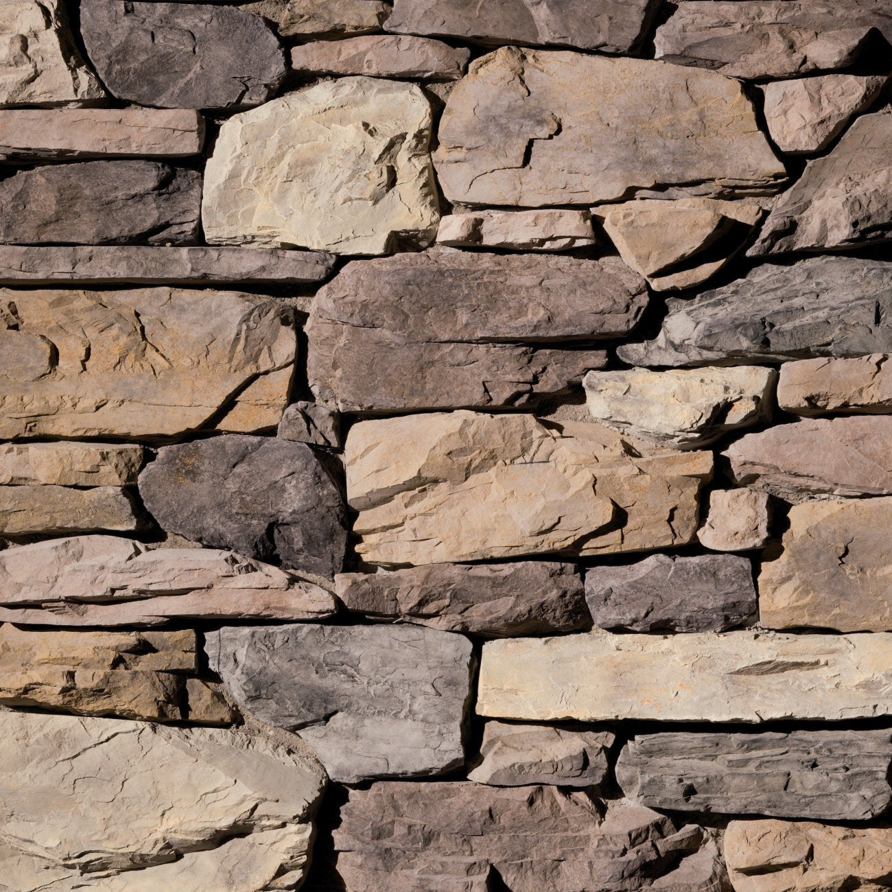 Eldorado Crescent Peak Shadow Rock with rugged, irregular stone faces in warm brown, gray, and charcoal tones
