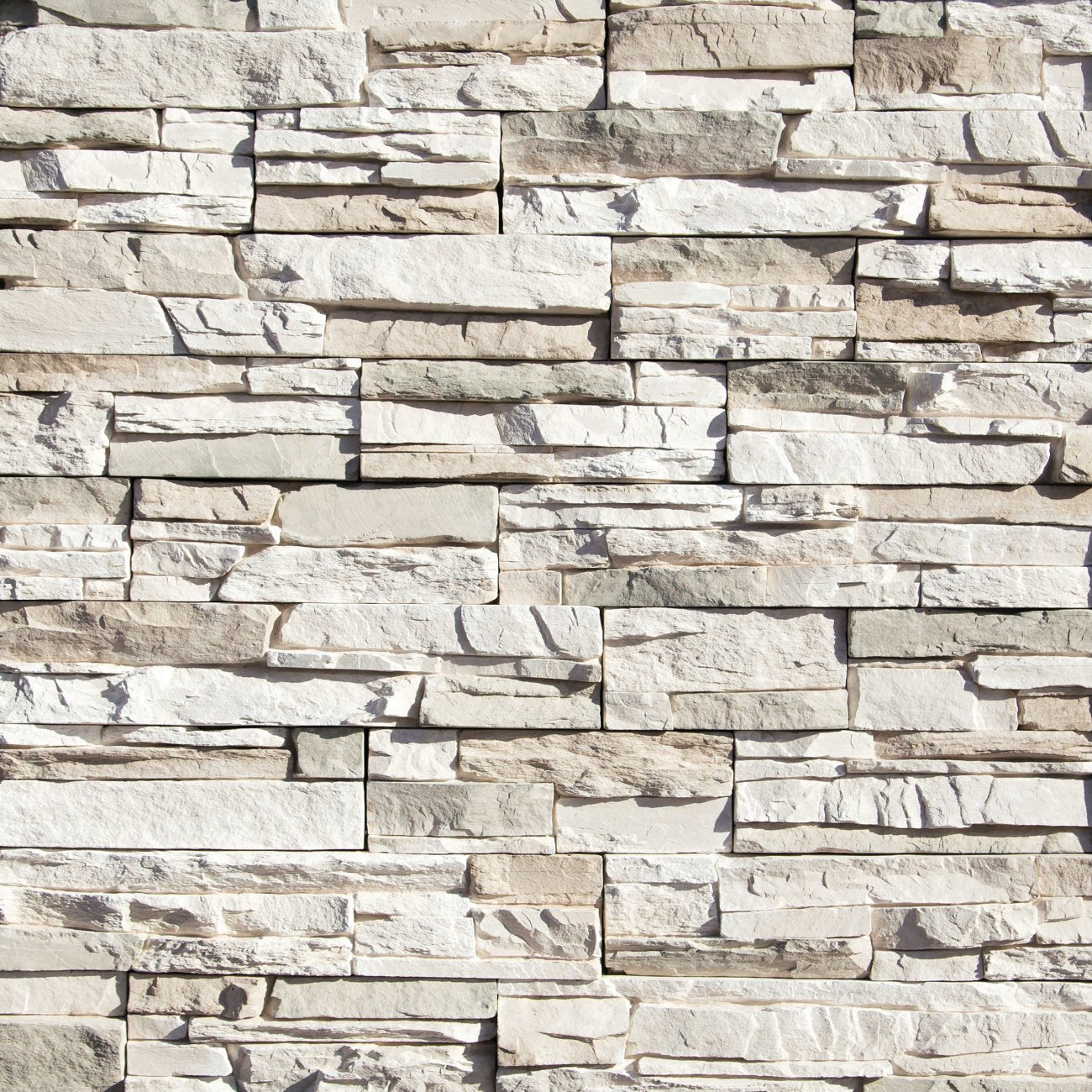 Eldorado Daybreak Stacked Stone with tightly fitted linear stones in soft tan, honey brown, and muted gray tones