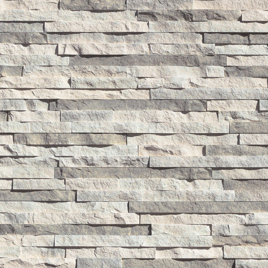 Eldorado Glacier European Ledge stone veneer in cool gray and white hues with linear, chiseled stone texture
