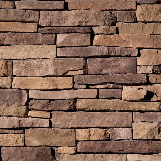 Eldorado Lexington Mountain Ledge ledgestone in cool gray and charcoal tones with rugged, hand-split texture