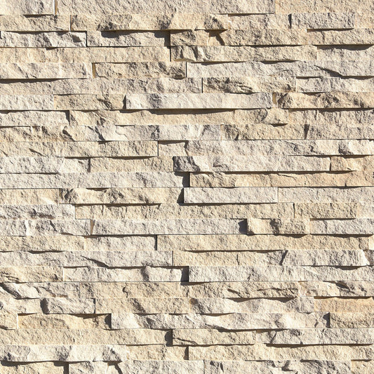 Eldorado Linen European Ledge stone veneer in soft white and cream hues with linear, chiseled stone texture