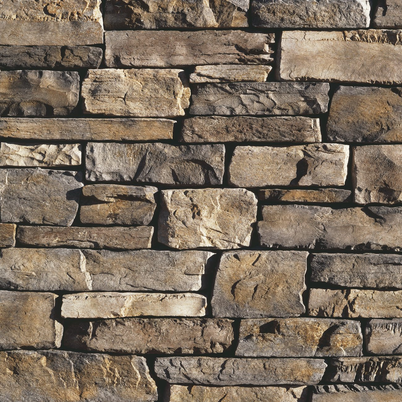 Eldorado Montecito Cliffstone stone veneer in soft cream and golden tones with natural ledgestone texture