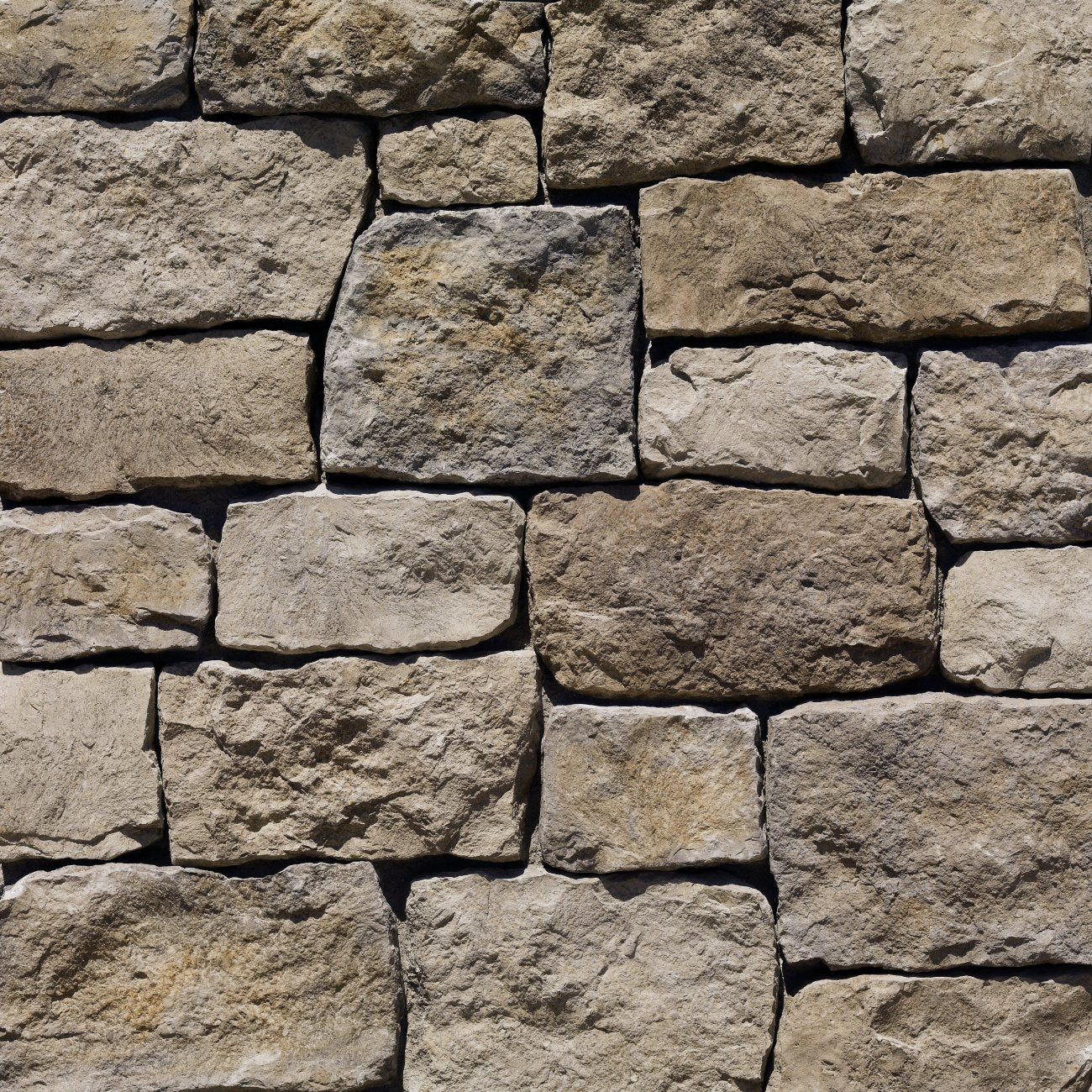 Eldorado Moonlight RoughCut stone with large chiseled faces in cool gray and silver tones