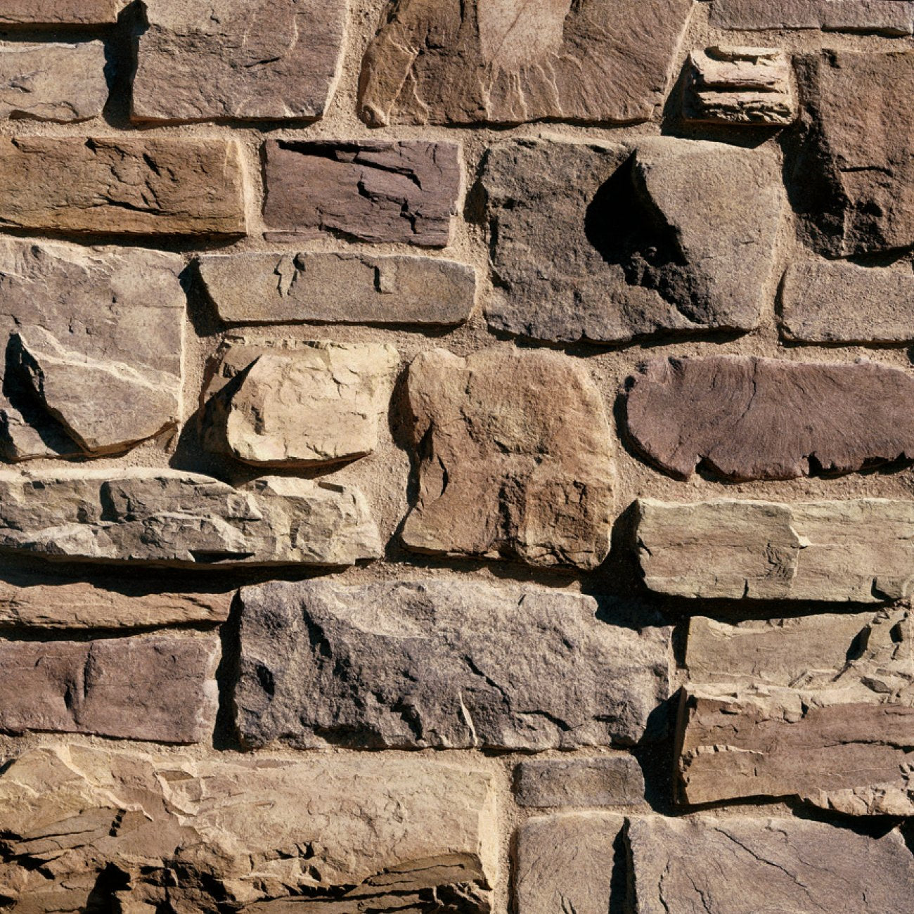 Eldorado Orchard Cypress Ridge stone veneer in warm cream and brown hues with rugged, hand-hewn stone texture